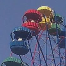several multi-colored cars from a ferris wheel